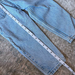 Load image into Gallery viewer, Vintage Levi's 550 Relaxed Fit Slim Orange Tab Jeans 4T
