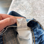 Load image into Gallery viewer, Vintage Levi's 550 Relaxed Fit Slim Fit Orange Tab Jeans 9 USA
