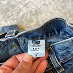 Load image into Gallery viewer, Vintage Levi's 550 Relaxed Fit Slim Orange Tab Jeans 7
