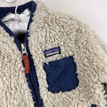 Load image into Gallery viewer, Patagonia Baby Retro-X Fleece Jacket Natural w/ Navy 2T
