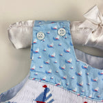 Load image into Gallery viewer, The Bailey Boys Smocked Blue Sailboat Jon Jon Romper 12 Months
