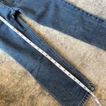 Load image into Gallery viewer, Vintage Levi's 550 Relaxed Fit Slim Orange Tab Jeans 7
