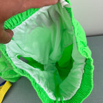 Load image into Gallery viewer, Vintage Nike Neon Green Swim Trunks 14/16
