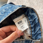 Load image into Gallery viewer, Vintage Levi's 550 Relaxed Fit Slim Fit Orange Tab Jeans 9 USA
