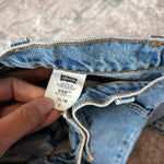 Load image into Gallery viewer, Vintage Levi's 550 Relaxed Fit Slim Orange Tab Jeans 9 USA
