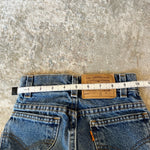 Load image into Gallery viewer, Vintage Levi's 550 Relaxed Fit Slim Orange Tab Jeans 7
