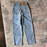 Load image into Gallery viewer, Vintage Levi's 550 Relaxed Fit Slim Orange Tab Jeans 9 USA
