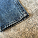 Load image into Gallery viewer, Vintage Levi's 550 Relaxed Fit Slim Orange Tab Jeans 7
