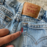 Load image into Gallery viewer, Vintage Levi's Cinched Waist Cut Off Blue Jean Shorts 6
