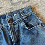 Load image into Gallery viewer, Vintage Levi's 550 Relaxed Fit Slim Orange Tab Jeans 7
