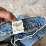 Load image into Gallery viewer, Vintage Levi's 550 Relaxed Fit Slim Orange Tab Jeans 9 USA
