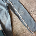 Load image into Gallery viewer, Vintage Levi's 550 Relaxed Fit Slim Orange Tab Jeans 9 USA
