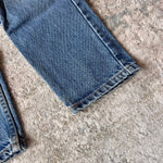 Load image into Gallery viewer, Vintage Levi's 550 Relaxed Fit Slim Fit Orange Tab Jeans 9 USA
