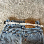Load image into Gallery viewer, Vintage Levi's 550 Relaxed Fit Slim Distressed Orange Tab Jeans 7
