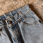 Load image into Gallery viewer, Vintage Levi's 550 Relaxed Fit Slim Orange Tab Jeans 9 USA
