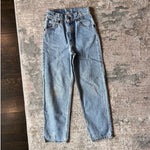Load image into Gallery viewer, Vintage Levi's 550 Relaxed Fit Slim Orange Tab Jeans 9 USA
