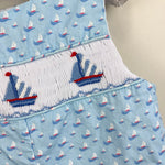 Load image into Gallery viewer, The Bailey Boys Smocked Blue Sailboat Jon Jon Romper 12 Months
