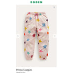 Load image into Gallery viewer, Mini Boden Printed Joggers Oatmeal Muti Stars 10
