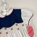 Load image into Gallery viewer, Vintage Polly Flinders Smocked Navy &amp; White Dress 5T NWT
