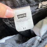 Load image into Gallery viewer, Vintage Levi&#39;s Black Denim Cinched Waist Jeans 4T
